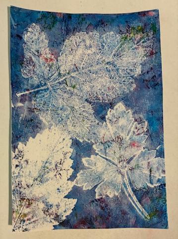 A leaf print on a blue background