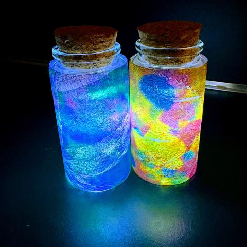 Glass Jar Lanterns lit in the dark